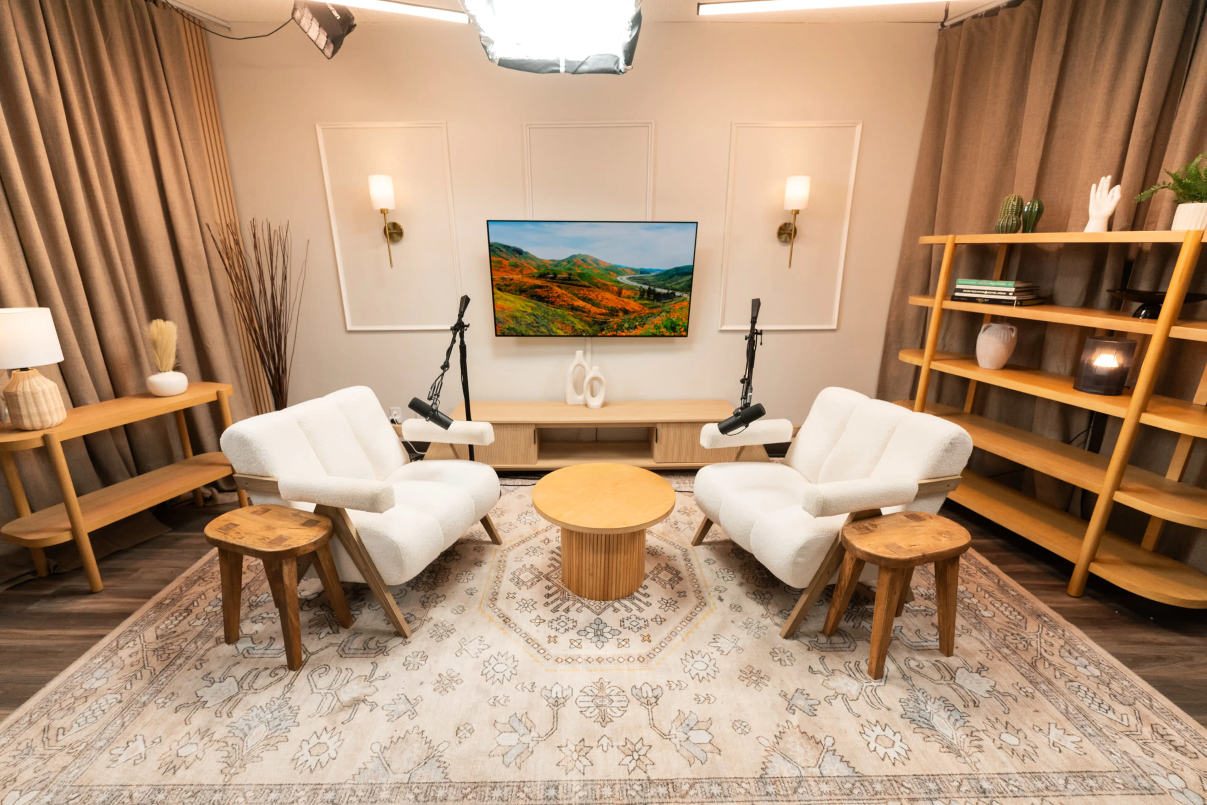 Warm cozy podcast lounge with microphones